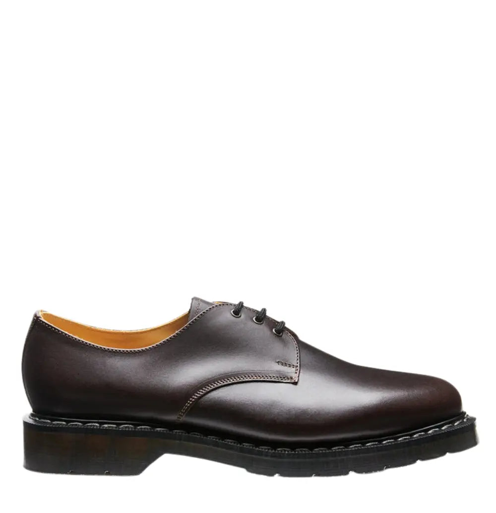 Brown leather shoe on a white background