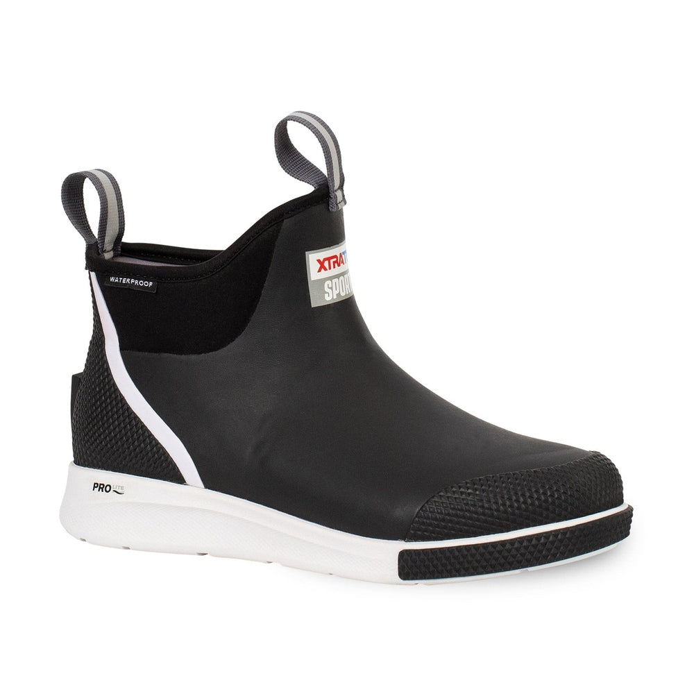 Black XTRATUF Ankle Deck Boot Sport with white sole, textured toe, and pull tabs.