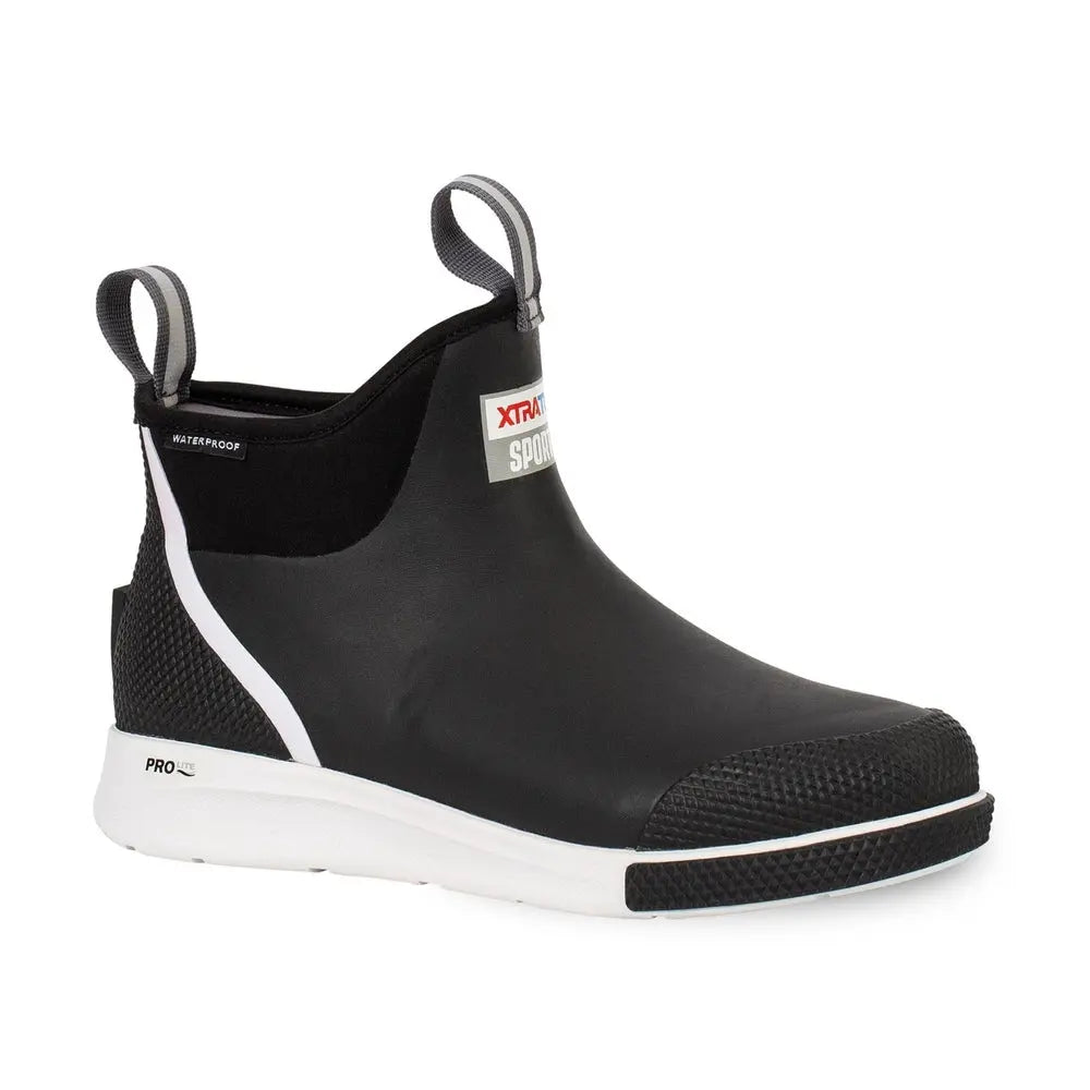 Black XTRATUF Ankle Deck Boot Sport with white sole, textured toe, and pull tabs.