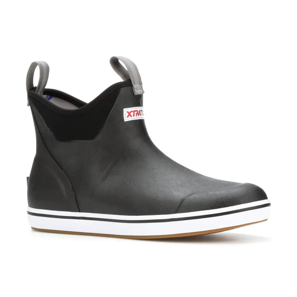 Black Xtratuf Ankle Deck Boot with white sole, grey pull tabs, and red logo.
