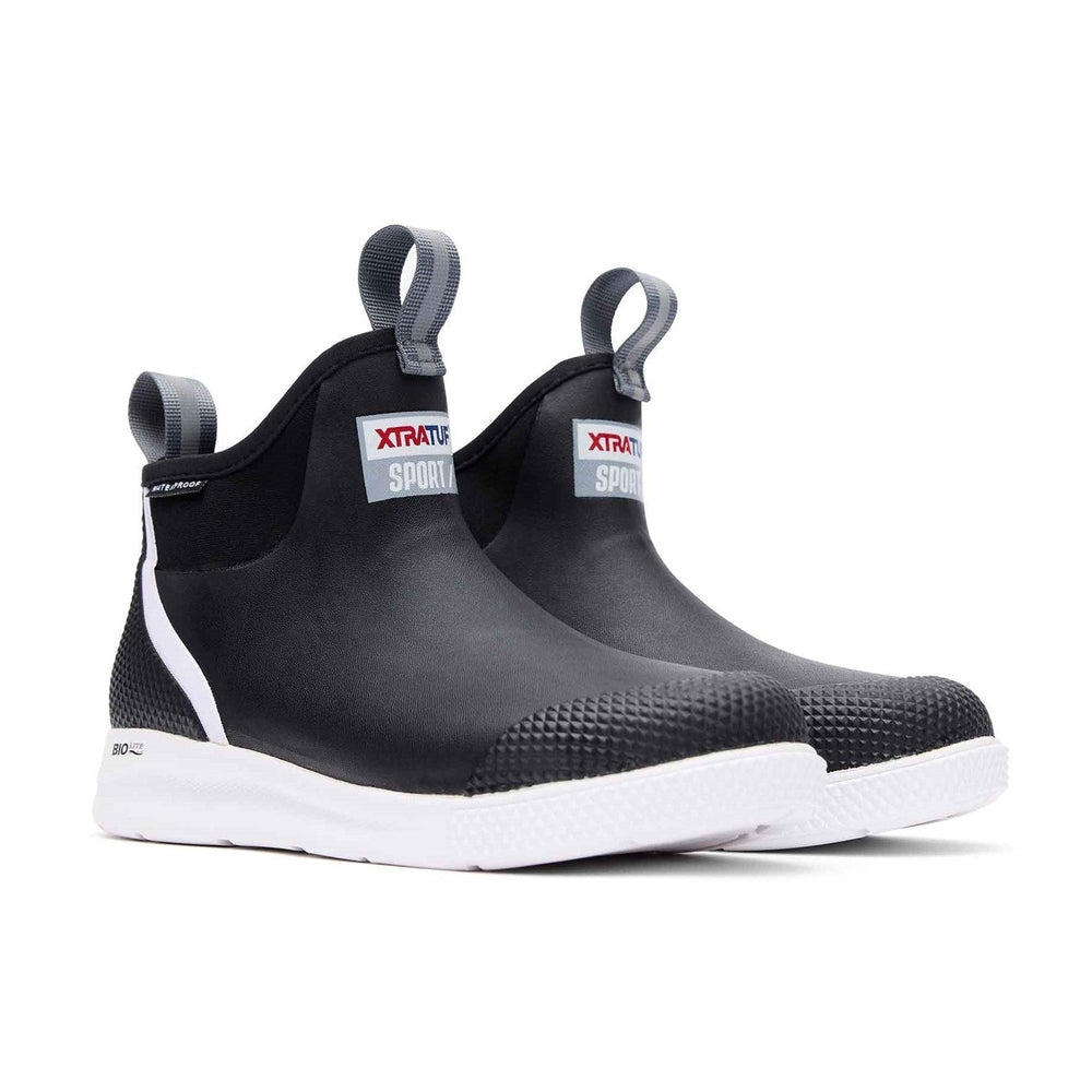 Black 6" Ankle Deck Boot Sport with white sole, grey pull tabs, and XTRATUF SPORT logo.