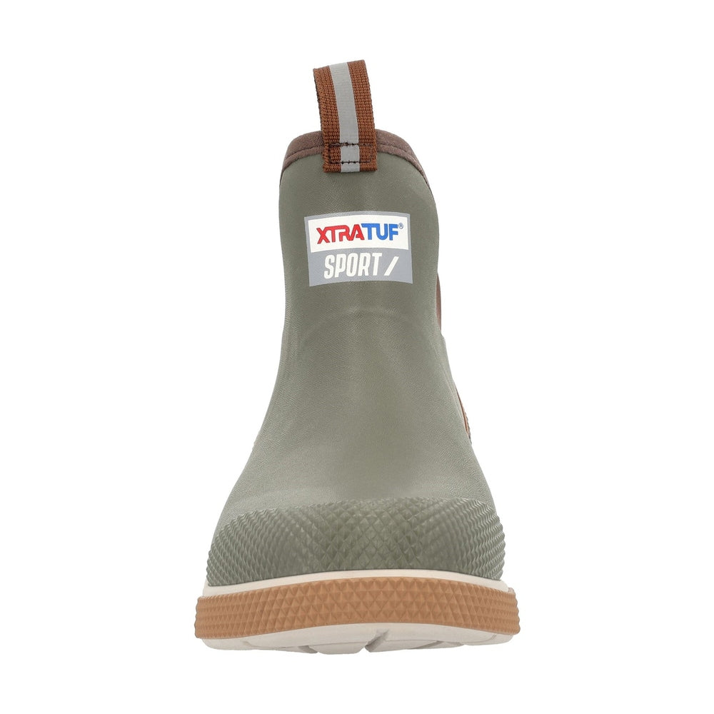 XTRATUF Ankle Deck Boot Sport in olive green with brown trim, textured toe, and tan sole.