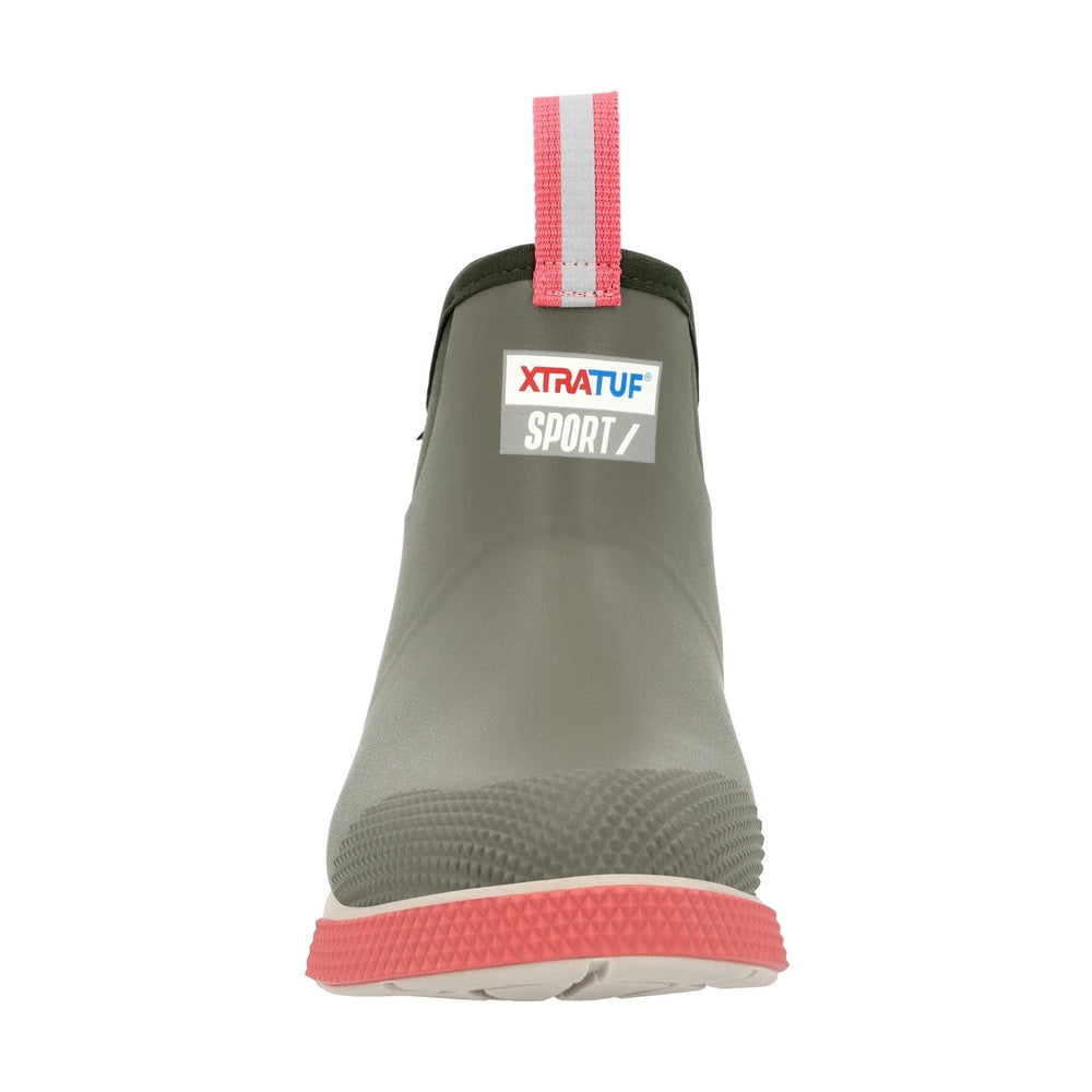 XTRATUF Sport Ankle Deck Boot in olive green with a textured toe, pink sole, and reflective pull tab.