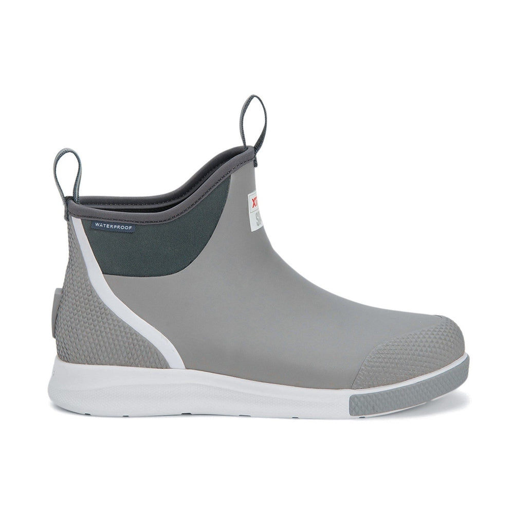 Grey Xtratuf Ankle Deck Boot Sport with white sole, textured heel, and "Waterproof" label.