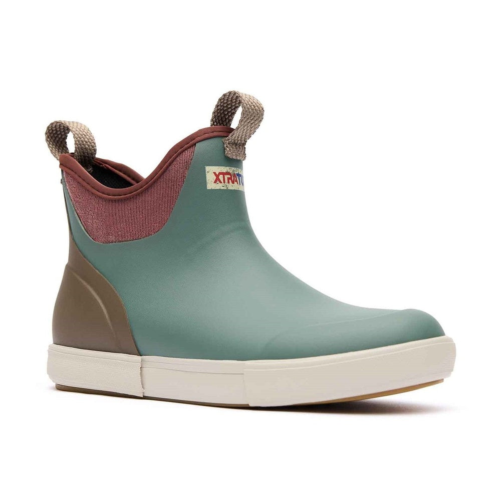 XTRATUF Ankle Deck Vintage Boot in teal, brown, and pink with pull tabs and a slip-resistant outsole.