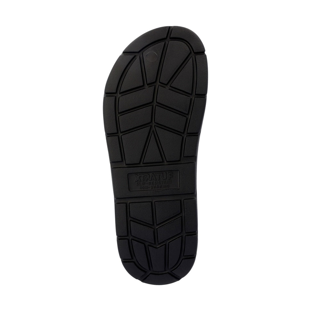 Black Apres Fish slide outsole with XTRATUF slip-resistant, non-marking tread pattern.