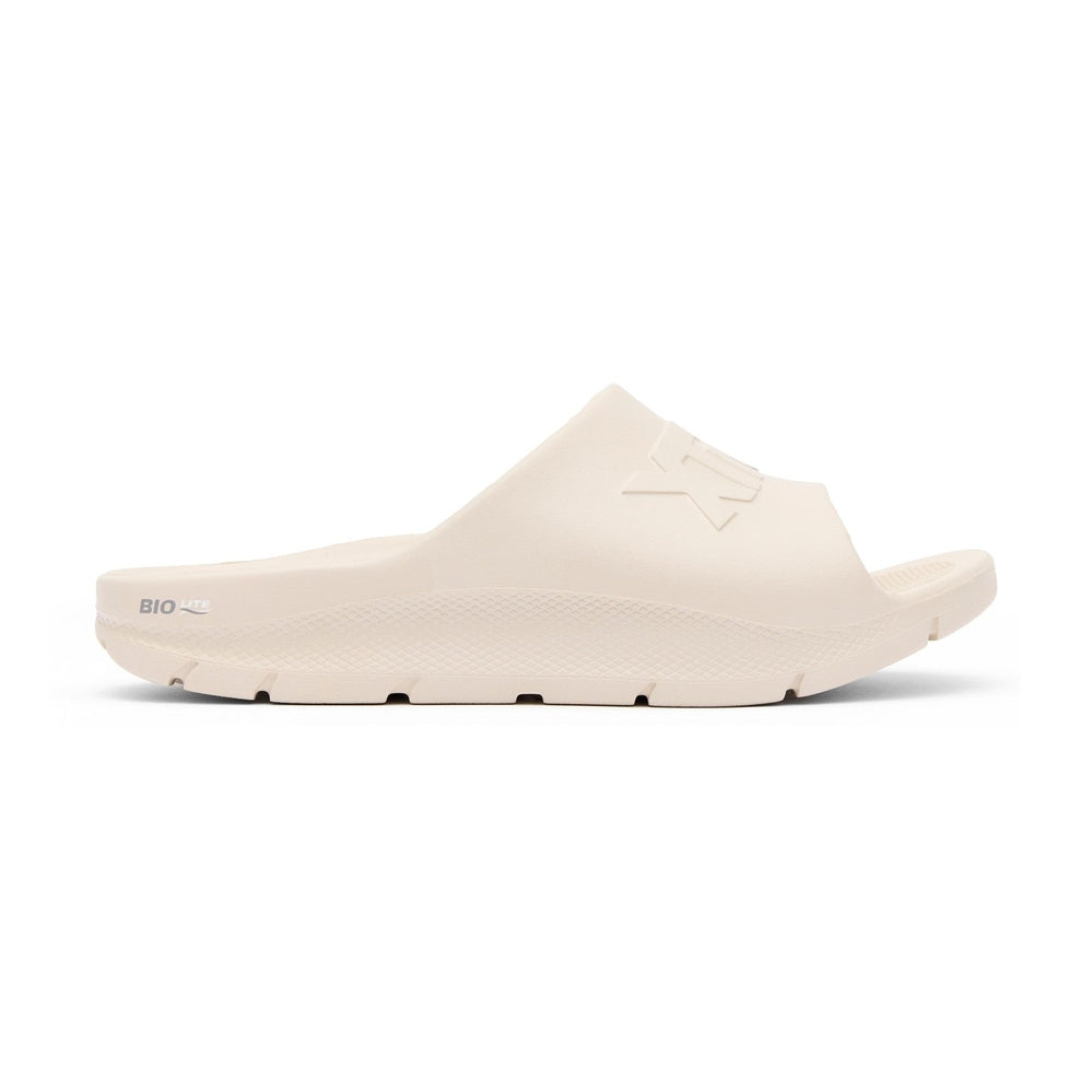 Light beige Apres Fish slide sandal with "BIO LITE" on the side and "IK" embossed on the strap.