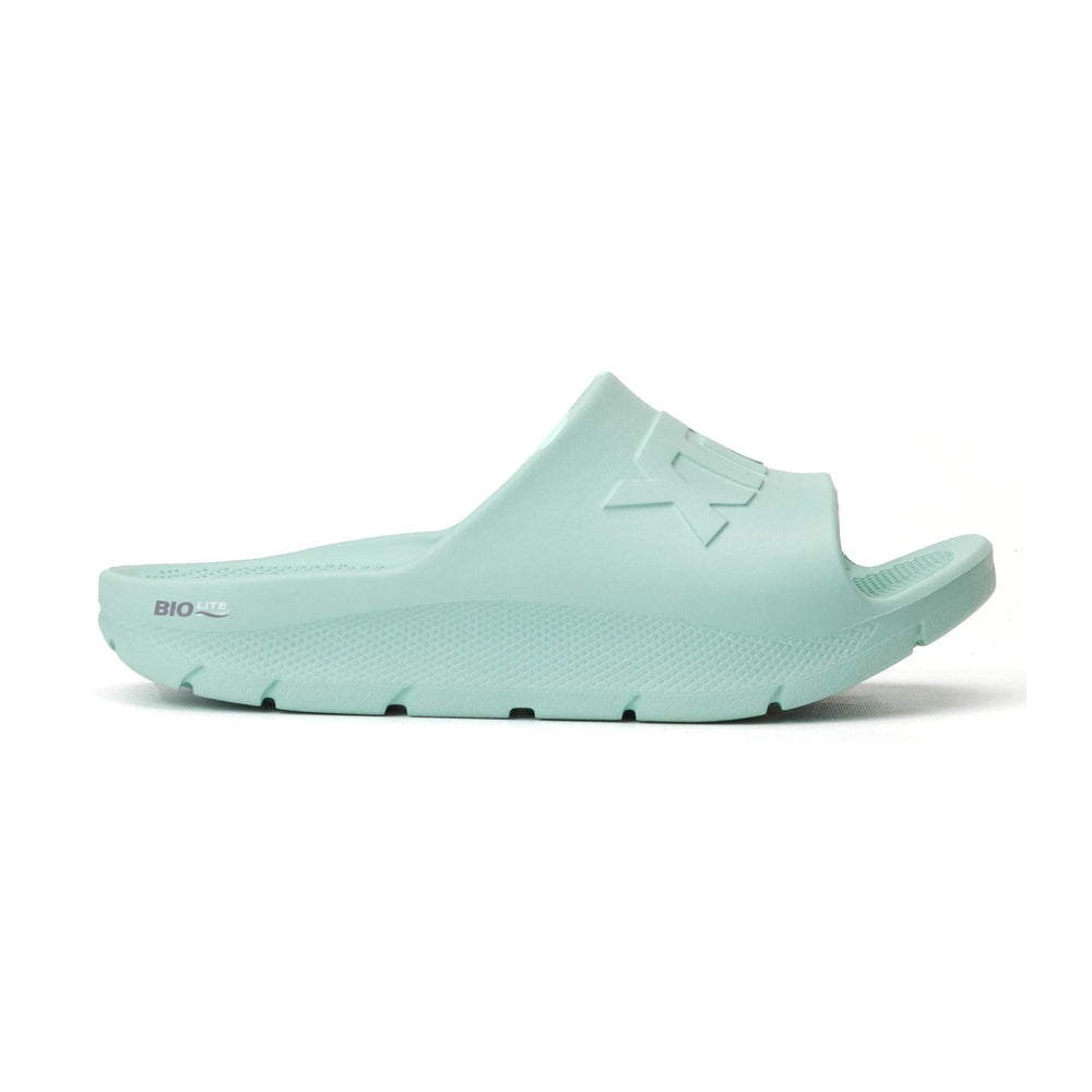 Mint green Apres Fish slide sandal, one-piece eco-conscious material, textured sole, "BIO LITE" branding.