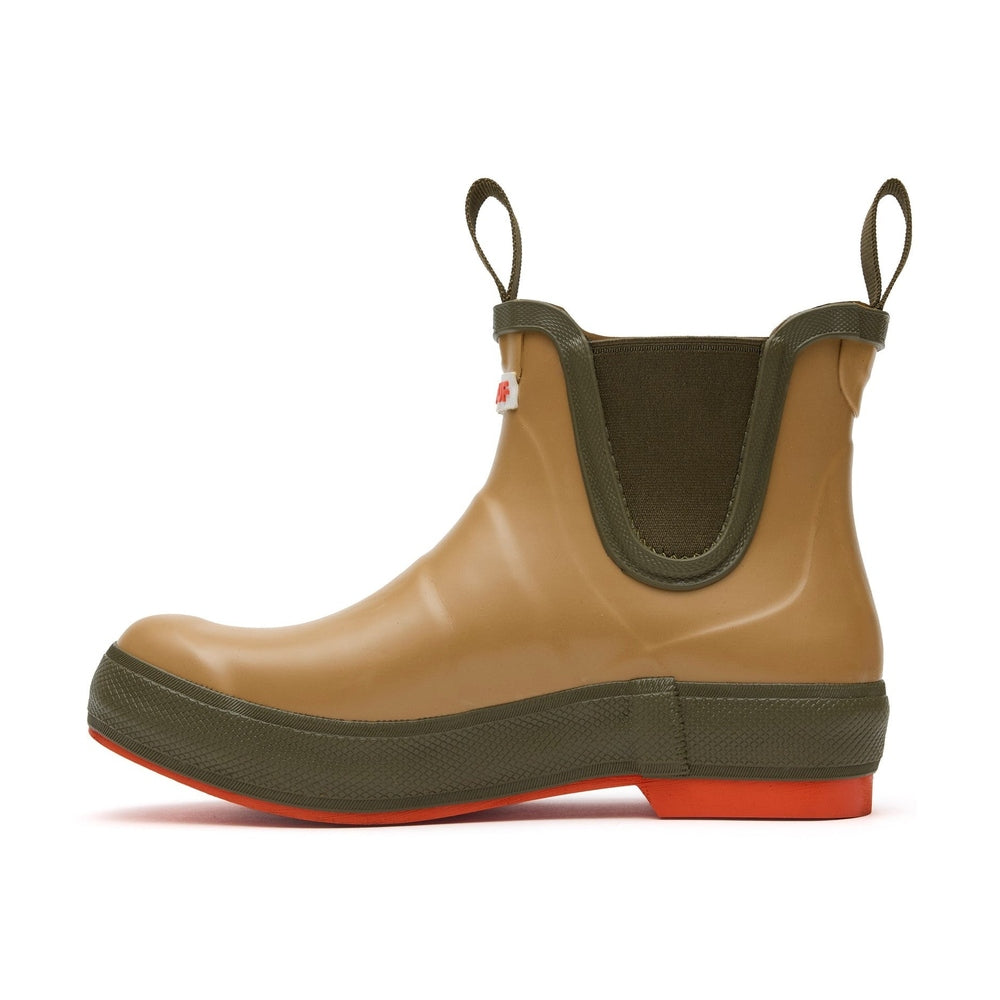 Tan Legacy Deck Boot with olive green sole and elastic, orange heel accent.