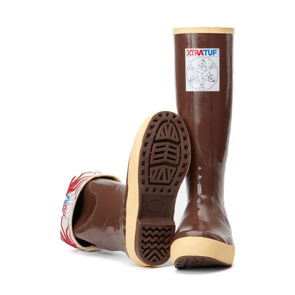 Brown Xtratuf Salmon Sisters 15" Legacy Boot with tan sole and cuff, featuring unique fish artwork.
