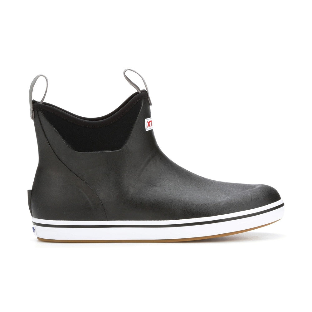 Black Xtratuf Ankle Deck Boot with white sole stripe, gray pull tabs, and slip-resistant Chevron outsole.