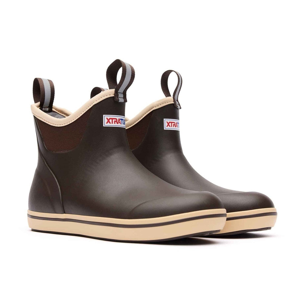 Pair of women's Xtratuf Ankle Deck Boots in brown with tan trim and slip-resistant soles.