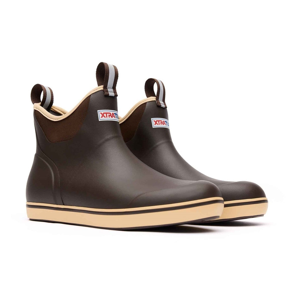 Pair of chocolate brown Xtratuf Ankle Deck Boots with tan soles and pull tabs.