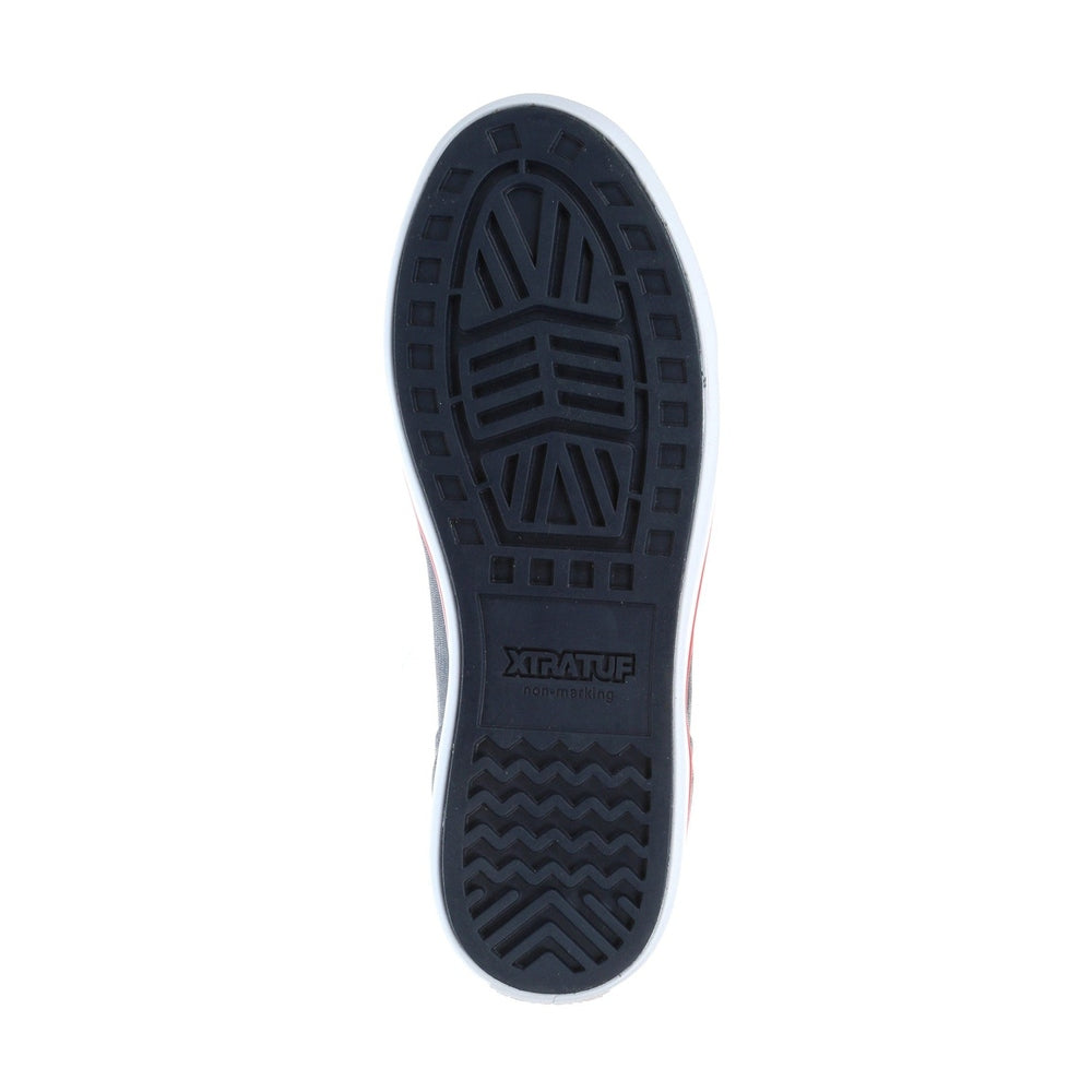 Xtratuf Ankle Deck Boot navy/red, showing the slip-resistant dark blue Chevron outsole with "XTRATUF non-marking" text.
