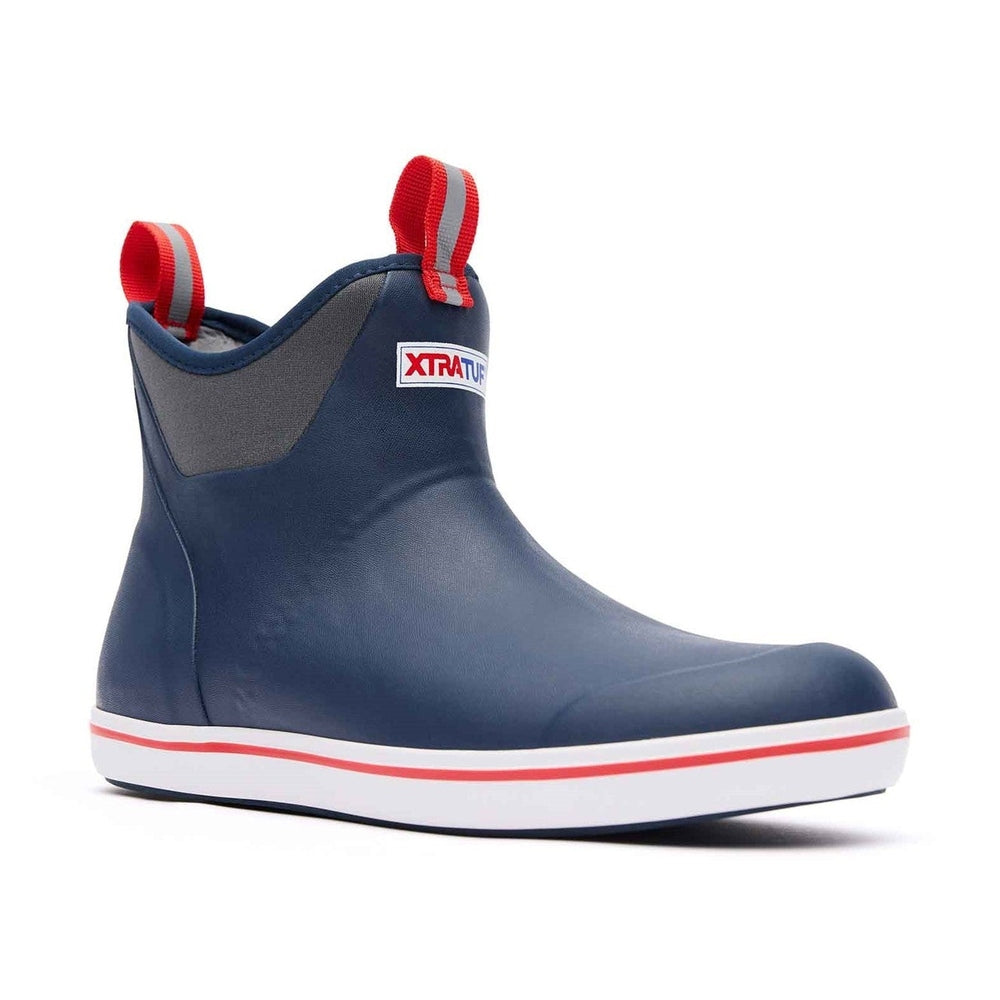 Xtratuf Ankle Deck Boot in navy with red pull tabs, grey trim, and a white sole with red stripe.