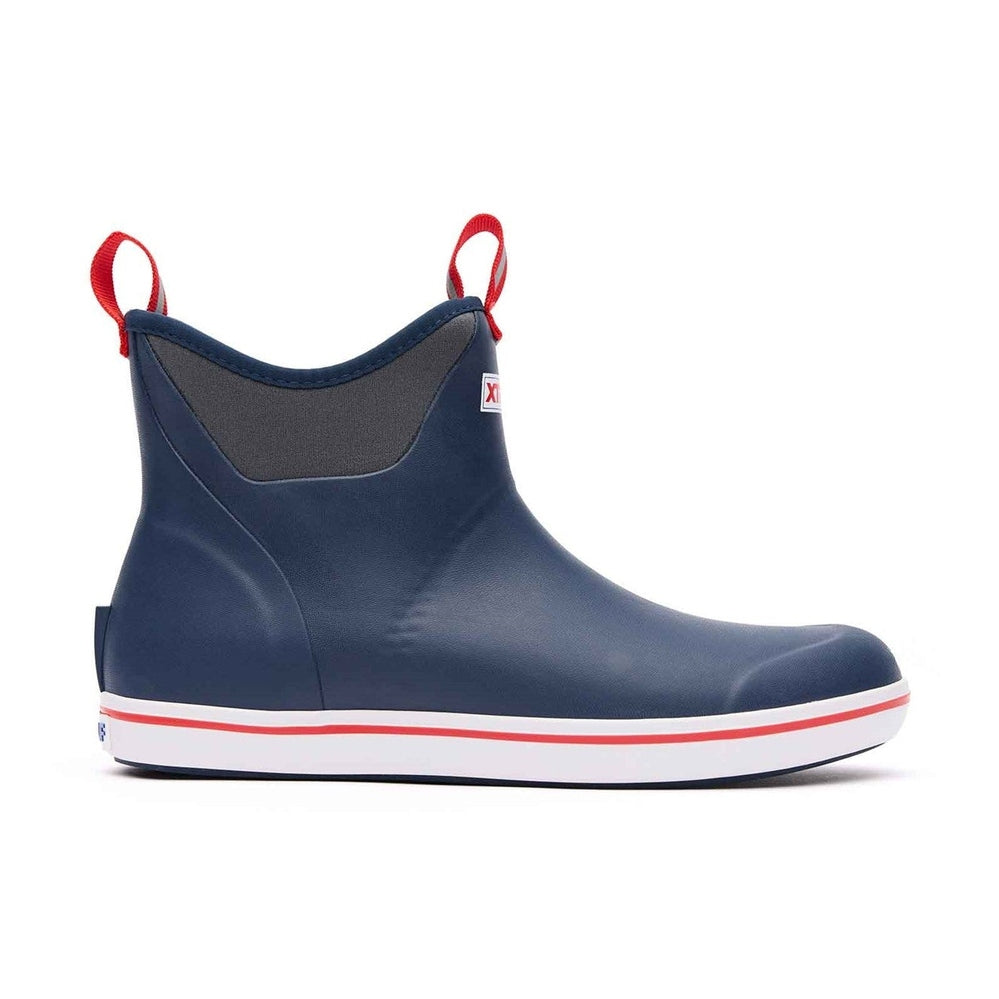 Navy Xtratuf Ankle Deck Boot with red pull tabs, white sole, and red stripe.